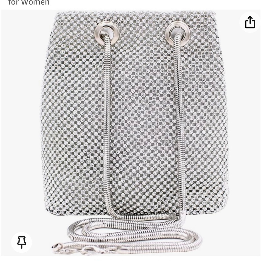 Small rhinestone bag. Like new. No missing rhinestones. Silver.